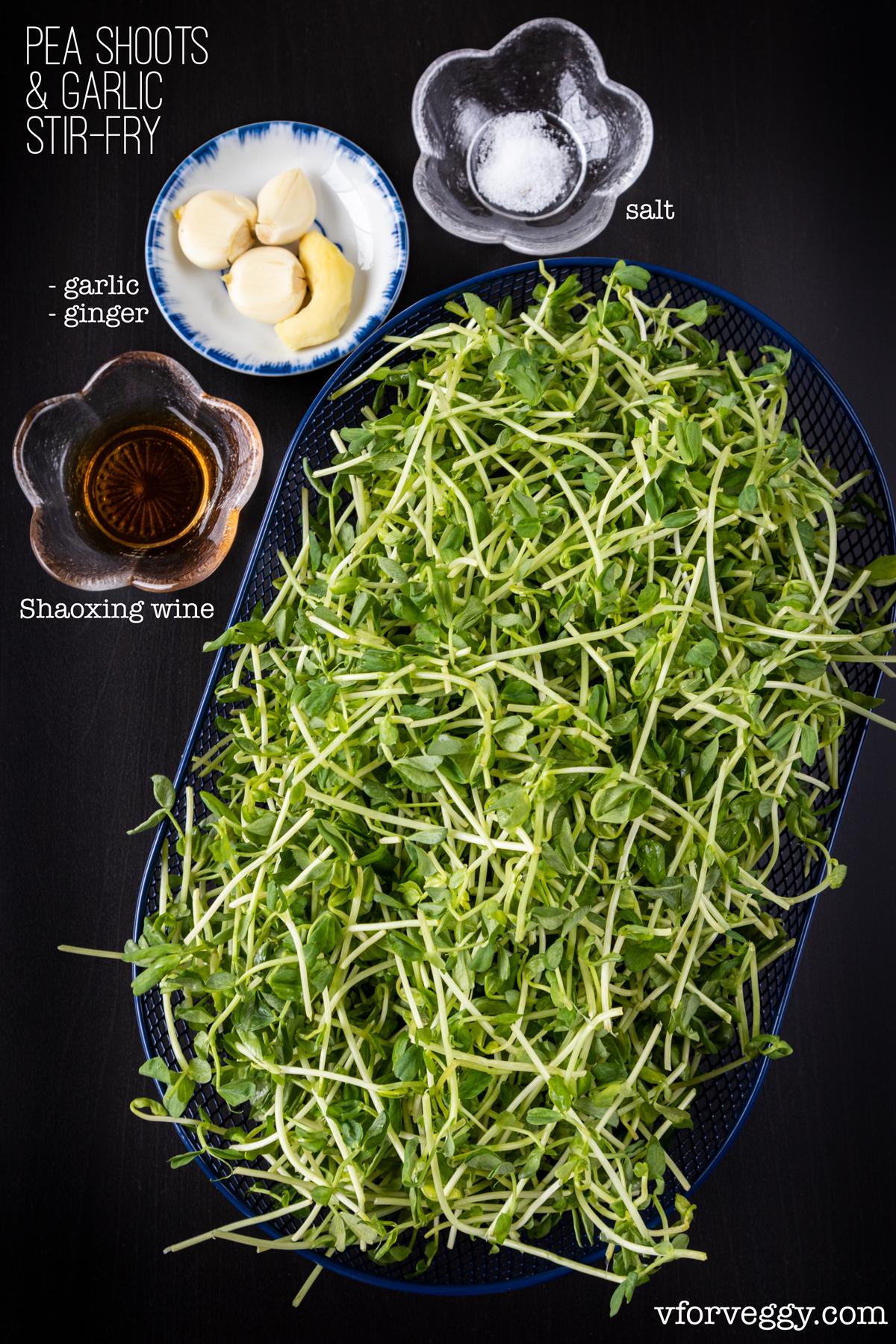 Ingredients for pea shoots and garlic stir-fry: pea shoots, garlic, ginger, Shaoxing wine, and salt.