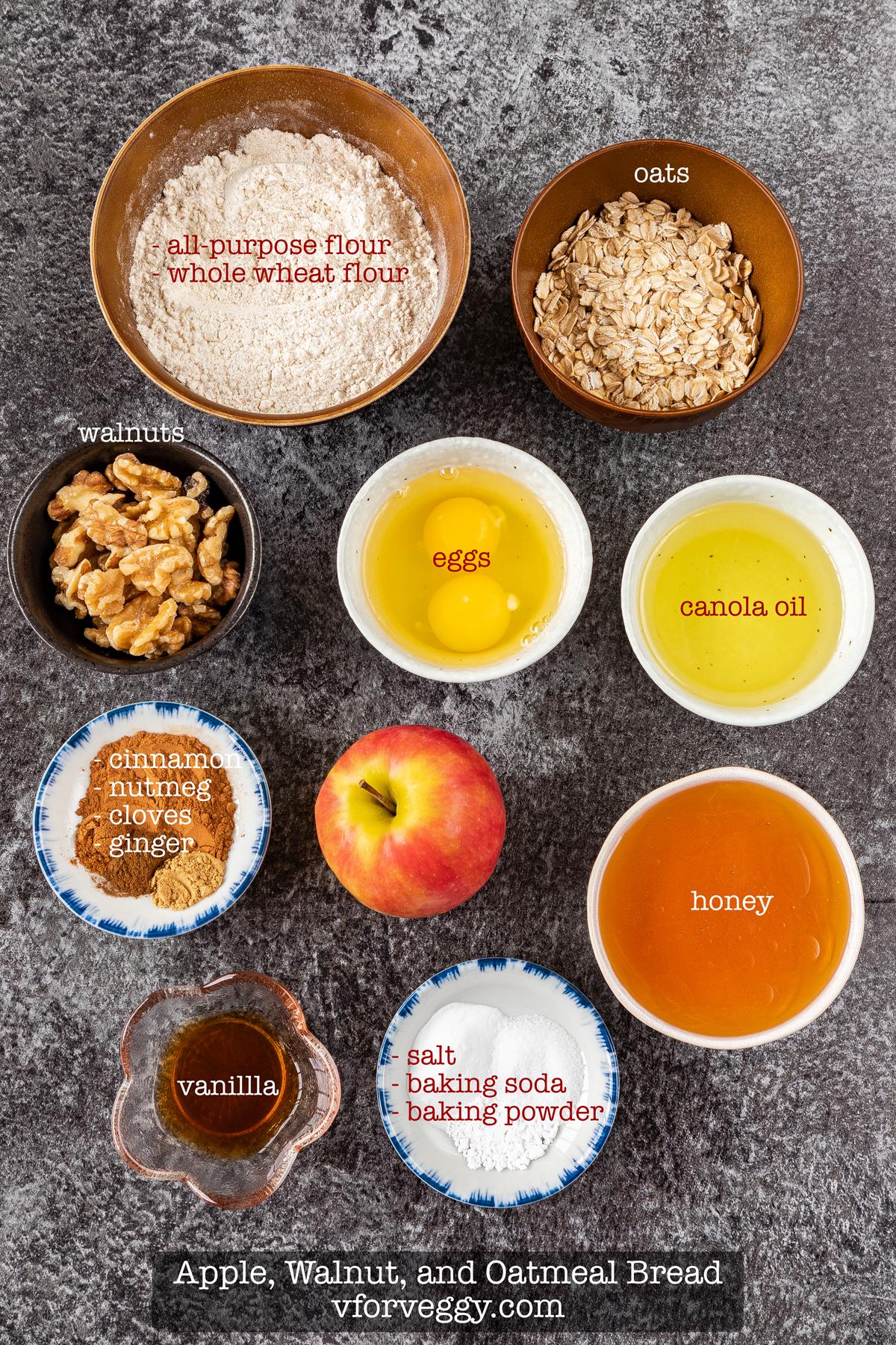 Ingredients for apple, walnut, and oatmeal bread: eggs, canola oil, honey, vanilla, all-purpose four, whole wheat flour, baking powder, baking soda, cinnamon, salt, nutmeg, clove, ginger, apple, oats, and walnut.